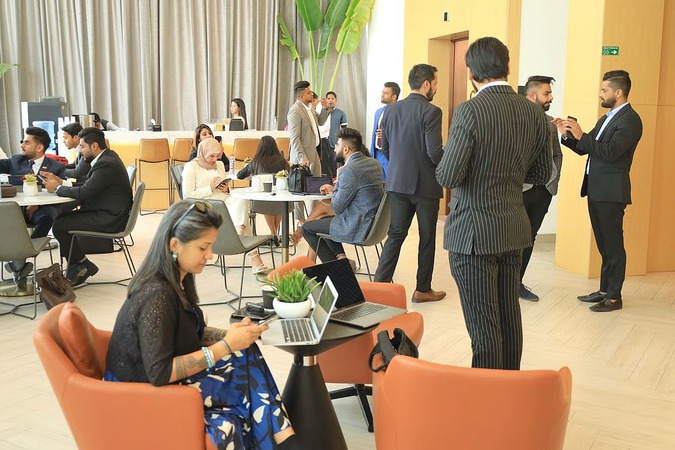 NRI investors exploring Dubai property with the guidance of a professional real estate agent